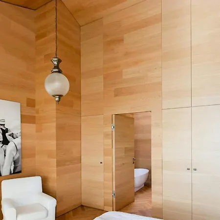 Wood Clad House At Eider's High Shore *