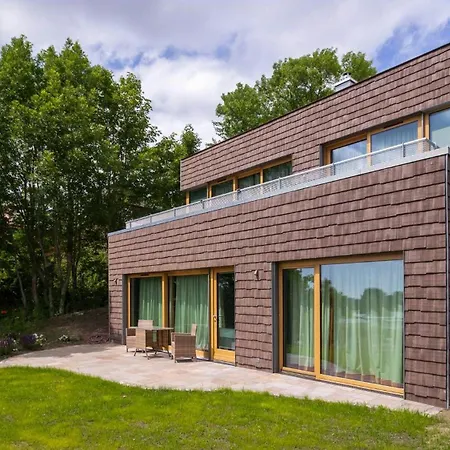 Wood Clad House At Eider's High Shore Süderstapel