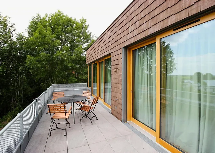 Wood Clad House At Eider's High Shore *